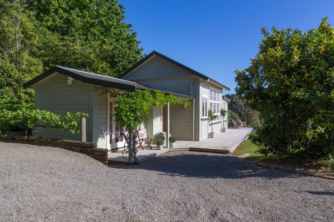 Kina Beach Cottages Tasman Exterior photo