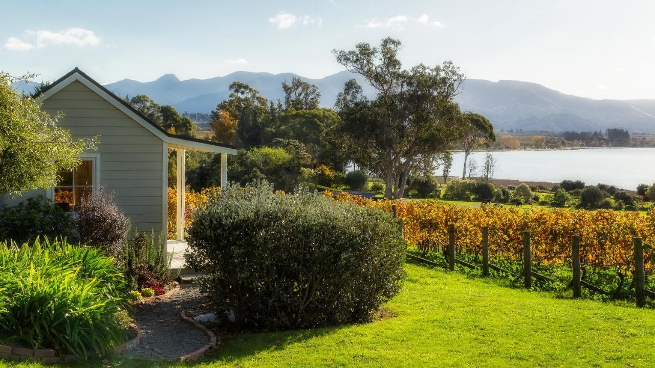 Kina Beach Cottages Tasman Exterior photo